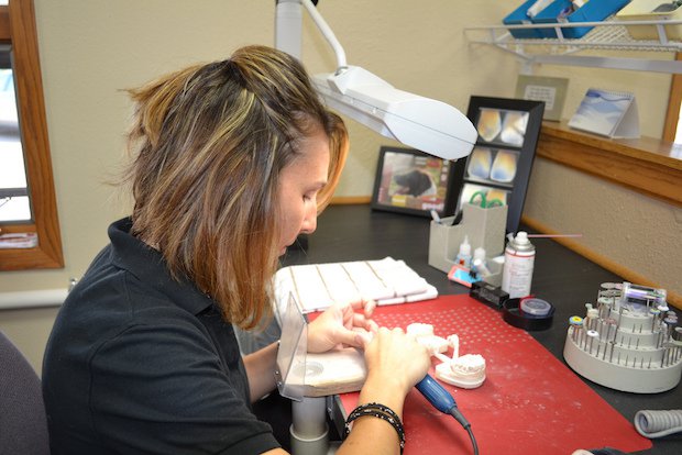 Finishing milled dental models at the Studio 32 lab.JPG Finishing milled dental models at the Studio 32 lab.JPG