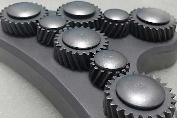 XJet metal cogs